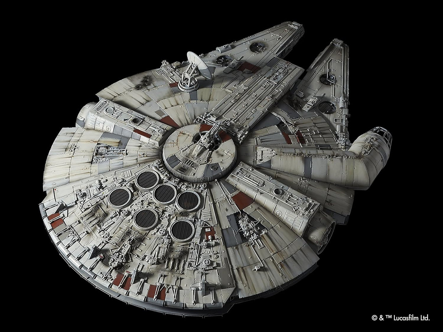 Model of the Millennium Falcon from Star Wars on a black background. 1/72 Perfect Grade Millennium Falcon