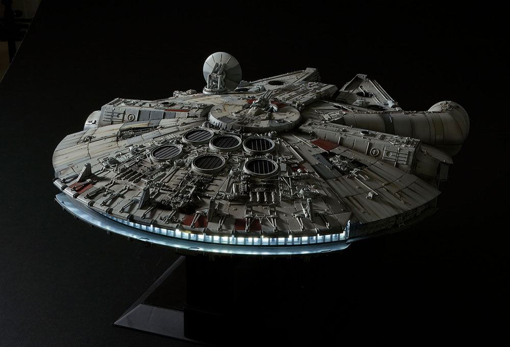 Model of the Millennium Falcon spaceship on a black background. 1/72 Perfect Grade Millennium Falcon